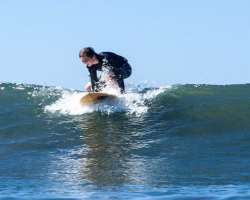 The actor loves surfing in his free time.